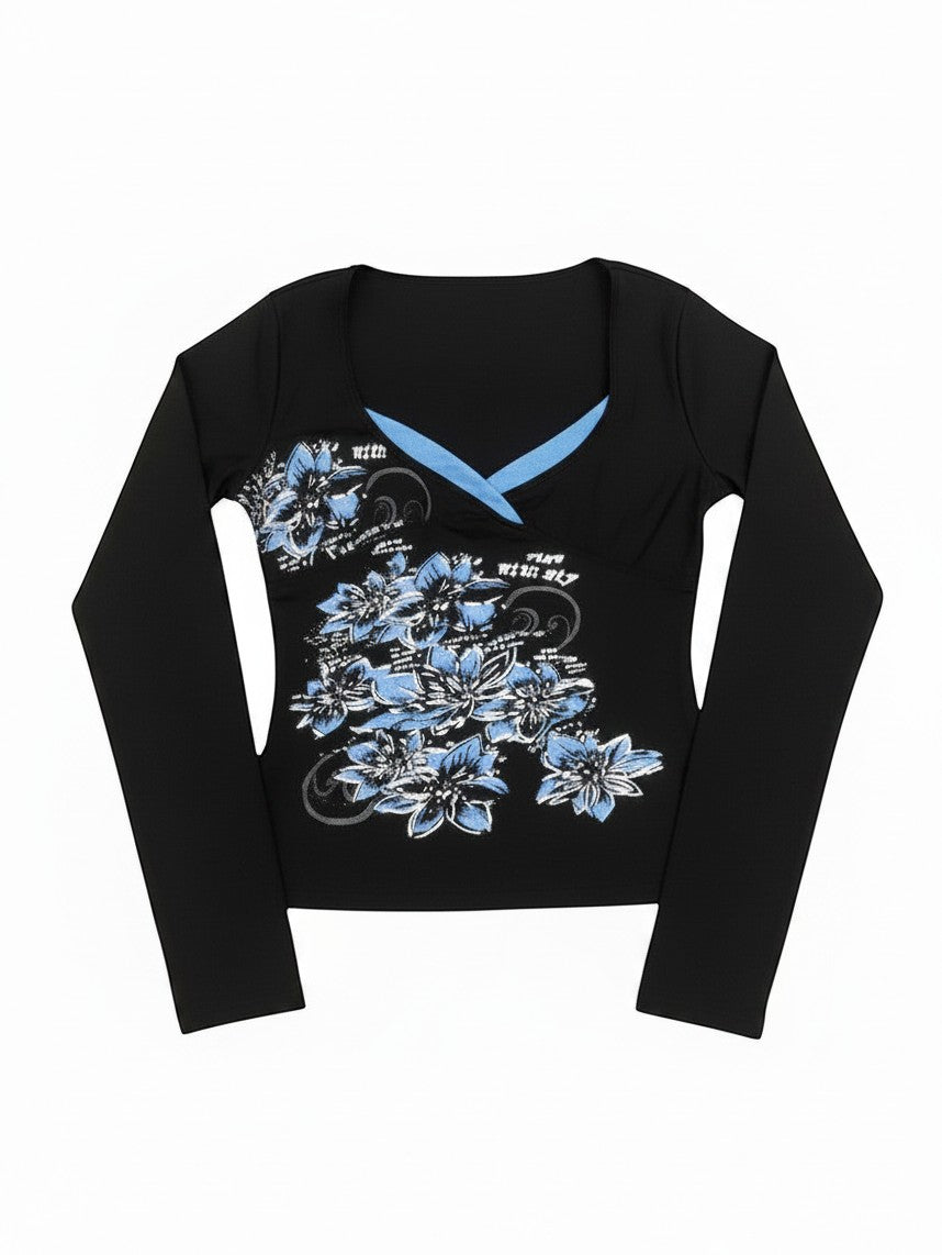 AuraXclusive black long sleeve top with a cross V-neckline, blue floral botanical print, and Y2K-inspired style.