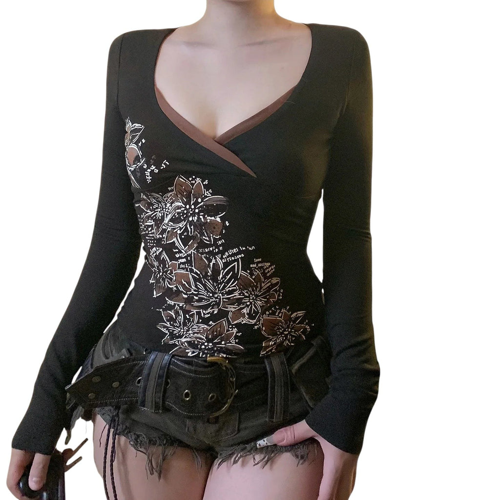 AuraXclusive slim-fit black long-sleeve top with a cross V-neck and white floral graphic print for a retro aesthetic.