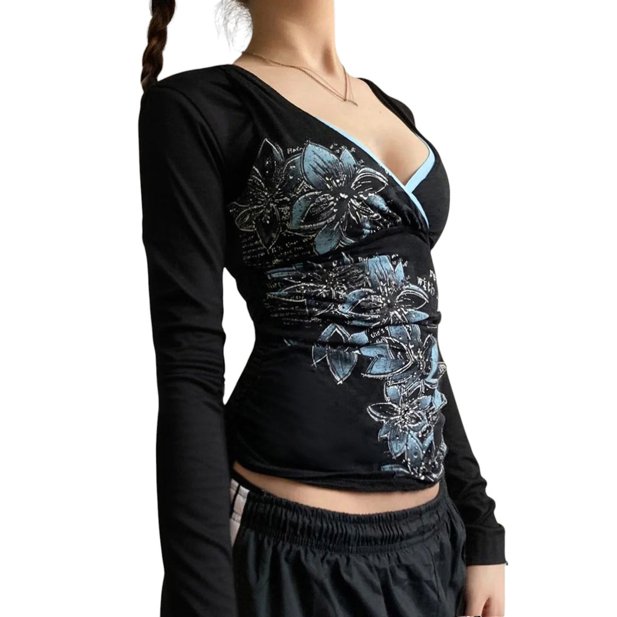 AuraXclusive slim-fit black long-sleeve top with a cross V-neck and blue floral graphic print for a retro aesthetic.