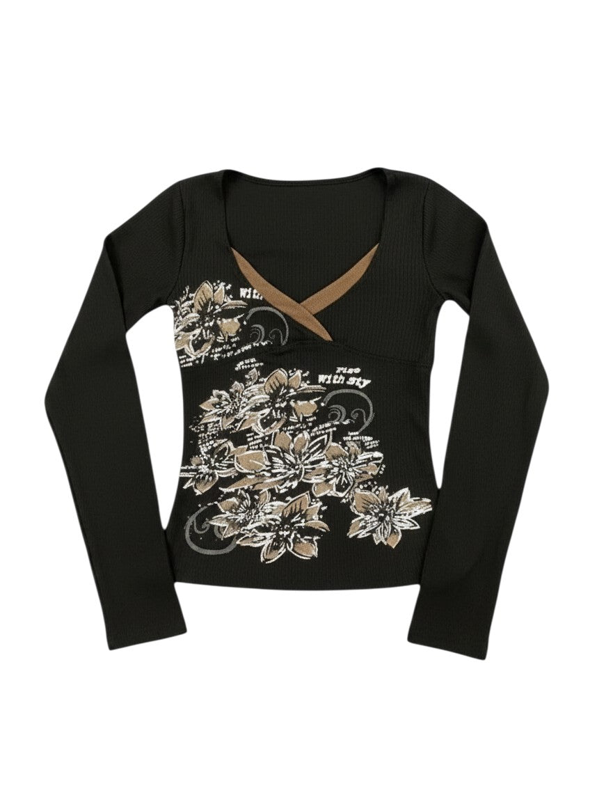AuraXclusive black long-sleeve slim-fit top with a cross V-neck and white floral graphic print in a retro style.