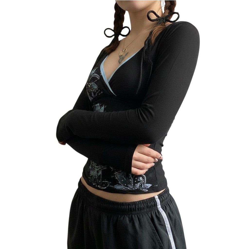 AuraXclusive slim-fit black long-sleeve top with a cross V-neck, featuring blue floral patterns and Harajuku style.