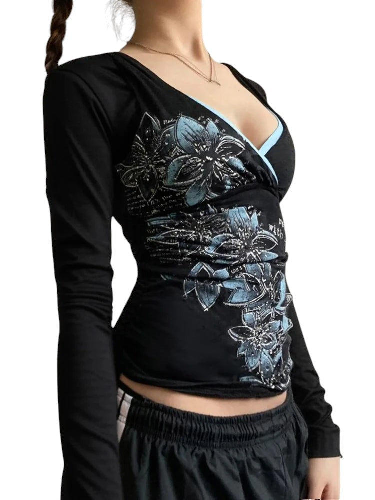 AuraXclusive black long-sleeve slim-fit top with a blue floral print and a sexy cross V-neck design for women.