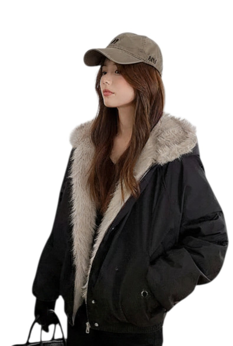AuraXclusive women's black winter jacket with a plush faux fur-lined hood, zipper closure, and casual loose fit.