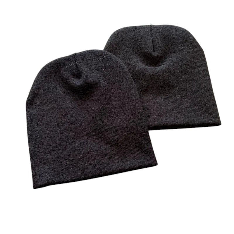 AuraXclusive black unisex knit beanies with a minimalist design, perfect for winter streetwear and casual outfits.