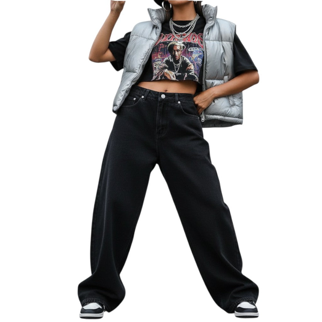 AuraXclusive model wearing black loose-fit jeans, a graphic crop top, and a silver puffer vest with a bucket hat.