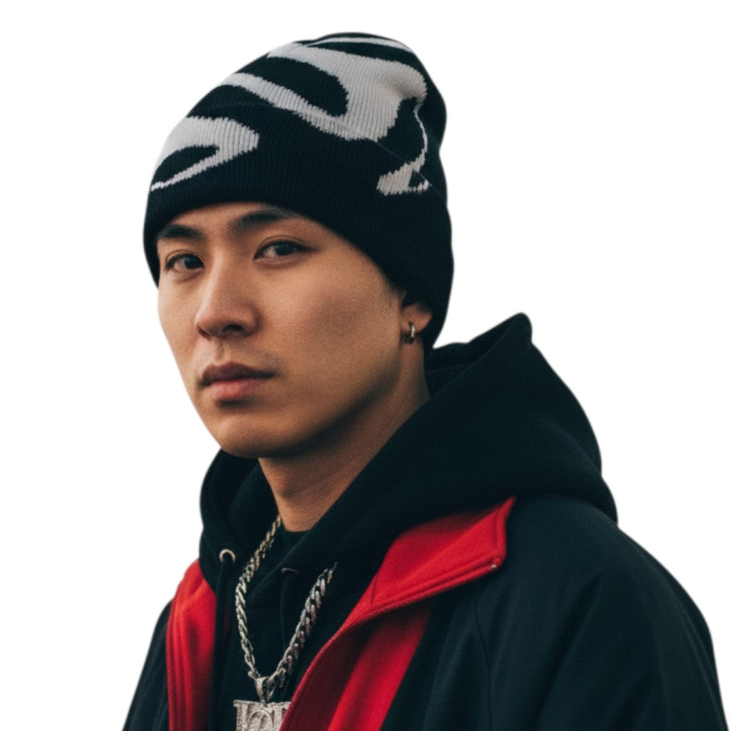 AuraXclusive unisex black and white knit beanie with a graphic tooth pattern worn by a man in streetwear style