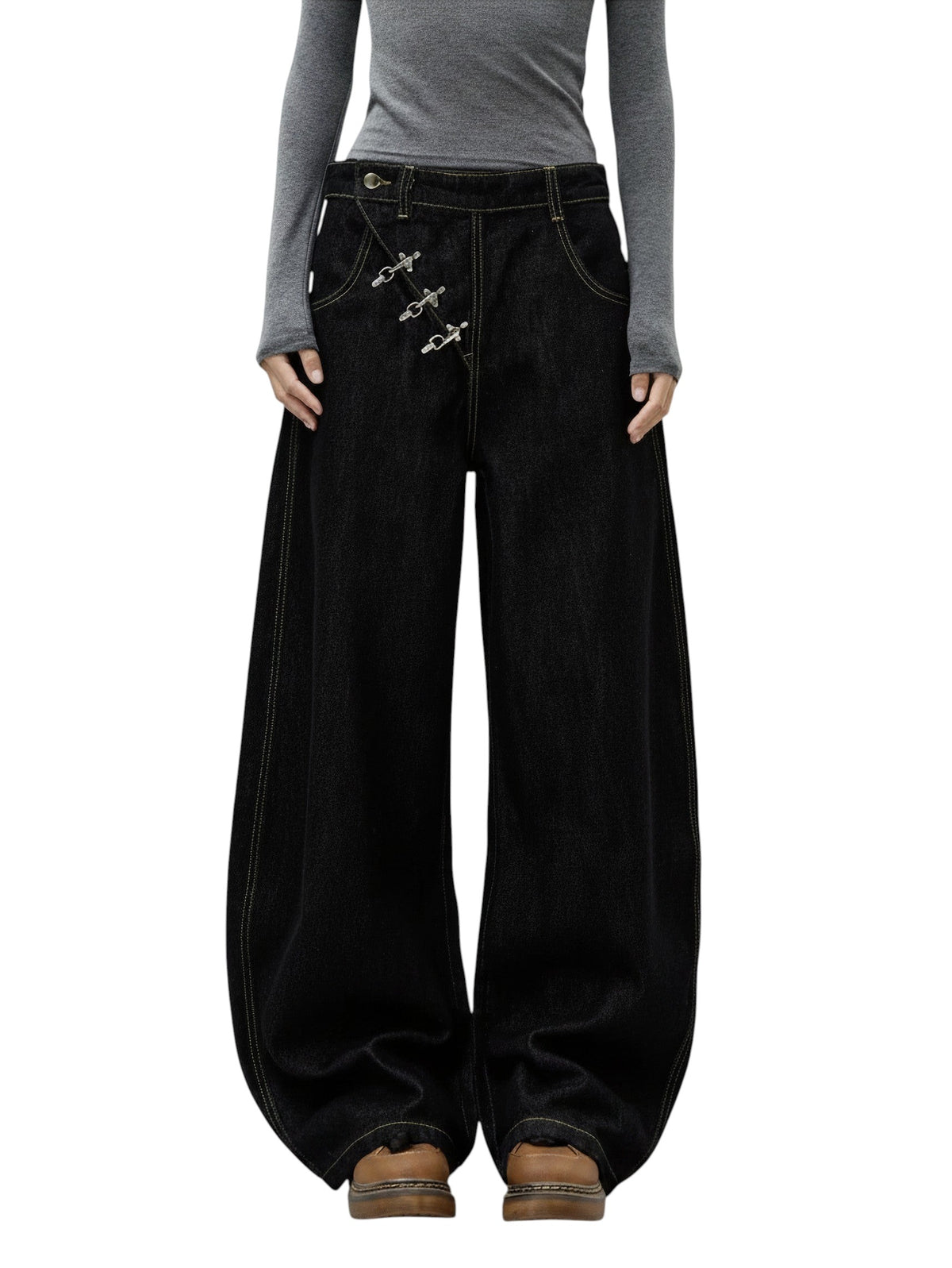 AuraXclusive black wide-leg denim jeans with high-rise waist, contrast stitching, and unique metal buckle detailing.