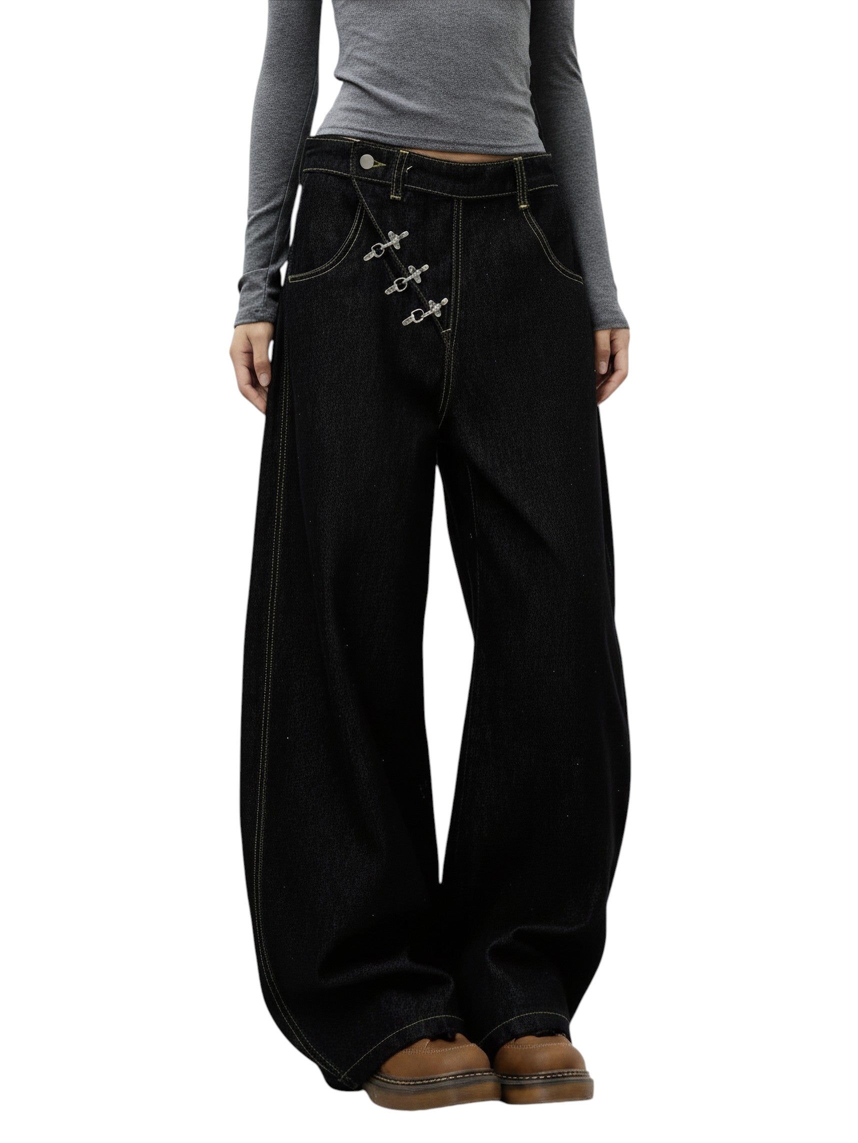 AuraXclusive black wide-leg jeans with a high-rise waist, contrast stitching, and unique metal buckle detailing.