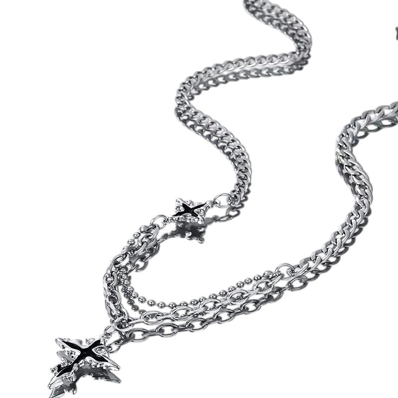 AuraXclusive vintage gothic cross pendant necklace featuring a layered stainless steel chain design in silver.