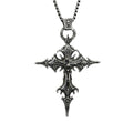 AuraXclusive neo-gothic silver-tone zinc alloy pendant necklace featuring an ornate nail cross and skull design.