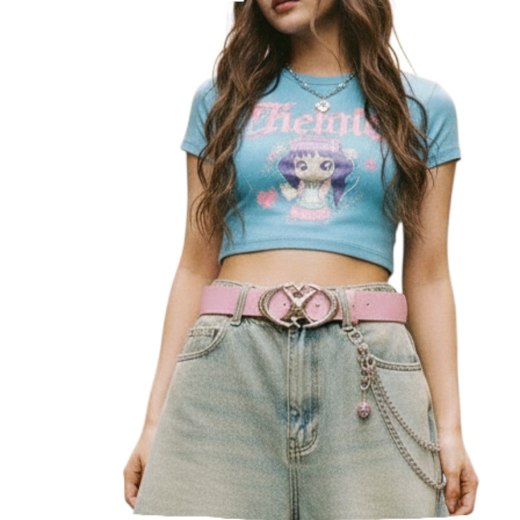 AuraXclusive unisex pink PU leather belt with a decorative oval cross metal buckle worn with blue denim jeans
