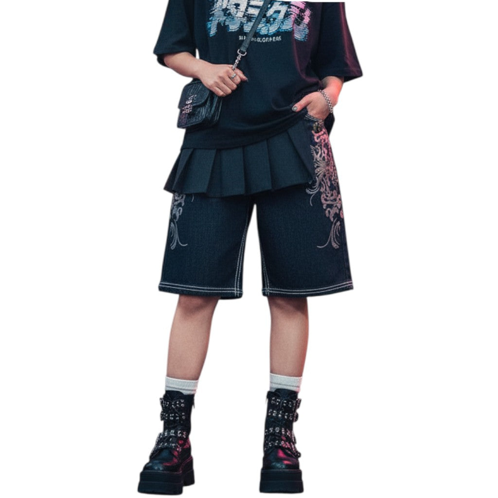 AuraXclusive Rapture denim jorts in black with white contrast stitching, graphic embroidery, and a relaxed knee-length fit.