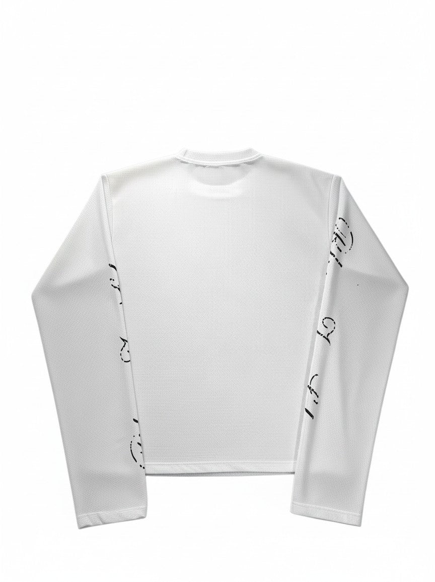 AuraXclusive white long-sleeved waffle-textured top with black graphic print on sleeves, Y2K style casual shirt.